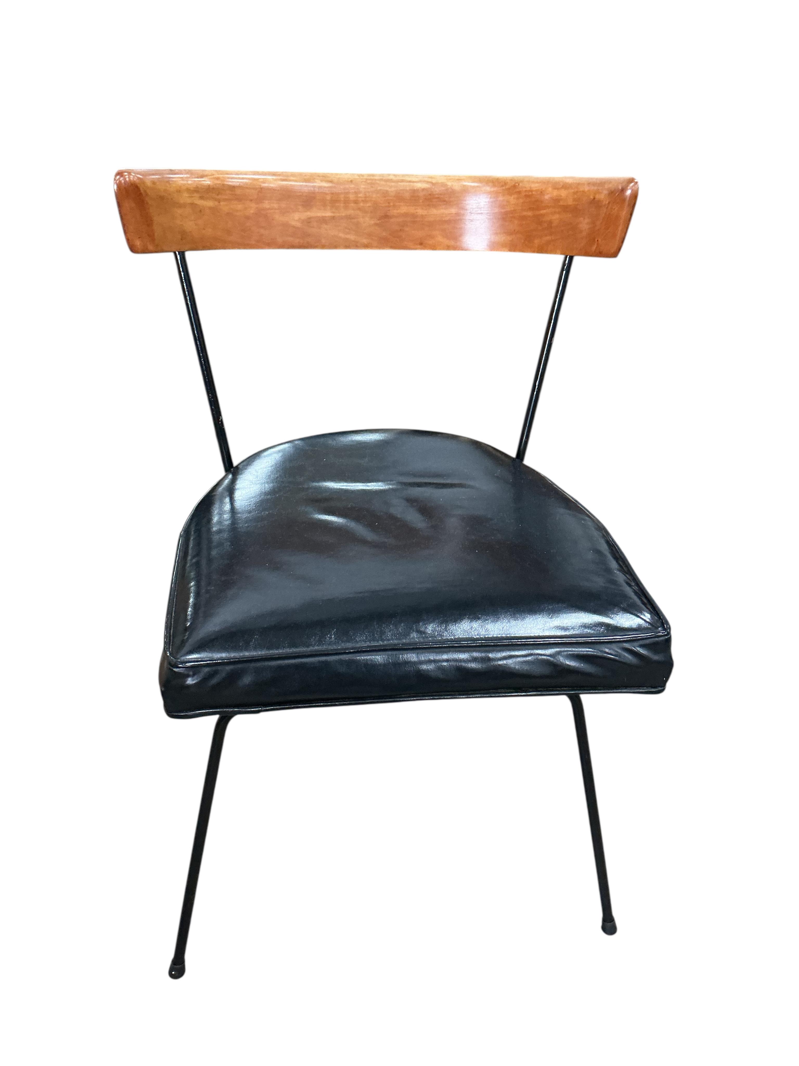 A pair of mid century dining chairs by Paul McCobb, width 43cm, depth 43cm, height 70cm